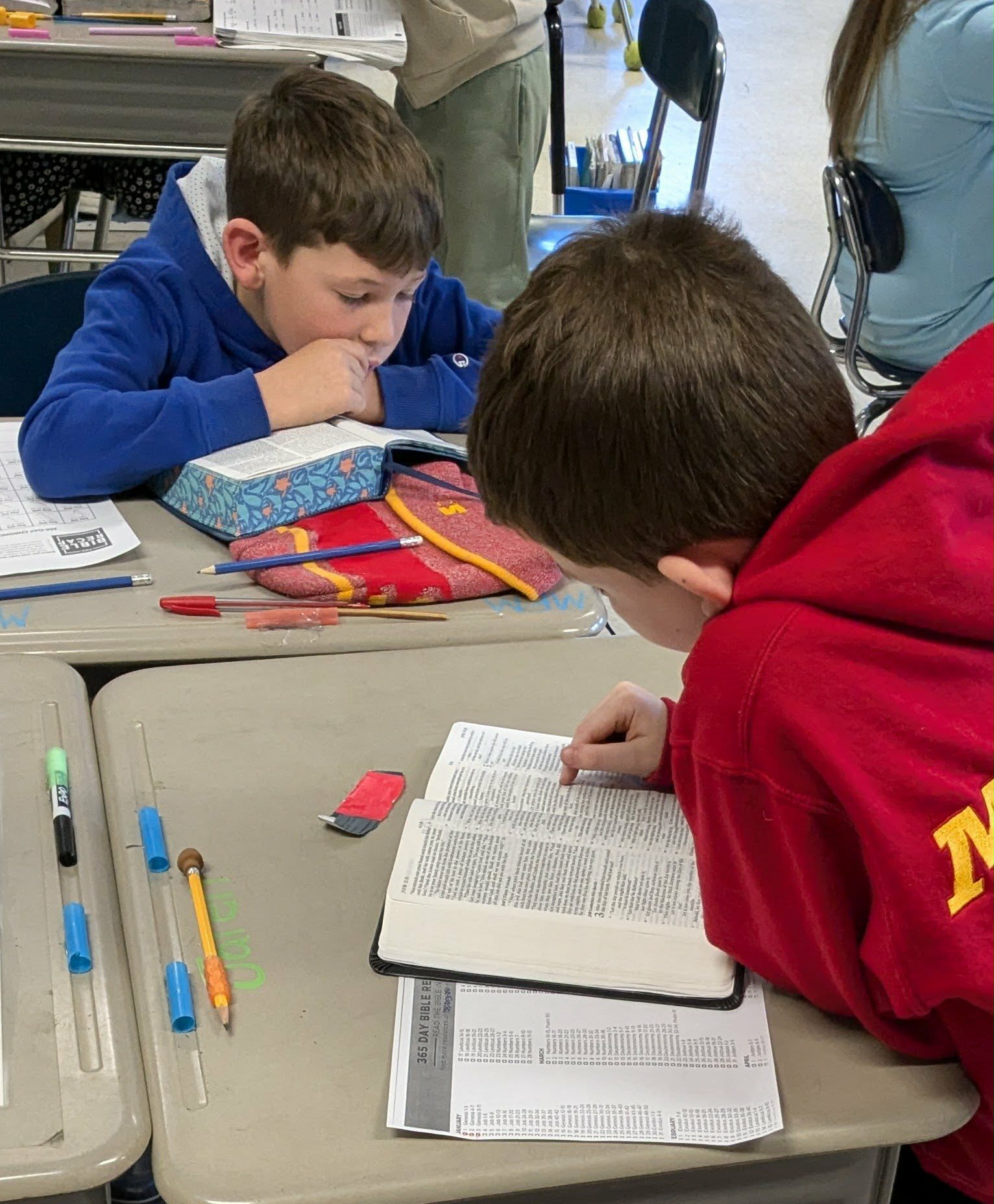 Students enjoying a book together